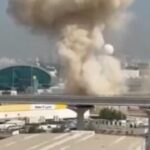 Hezbollah Barrage Strikes Central Israel; IDF Hits Military Targets in Iran