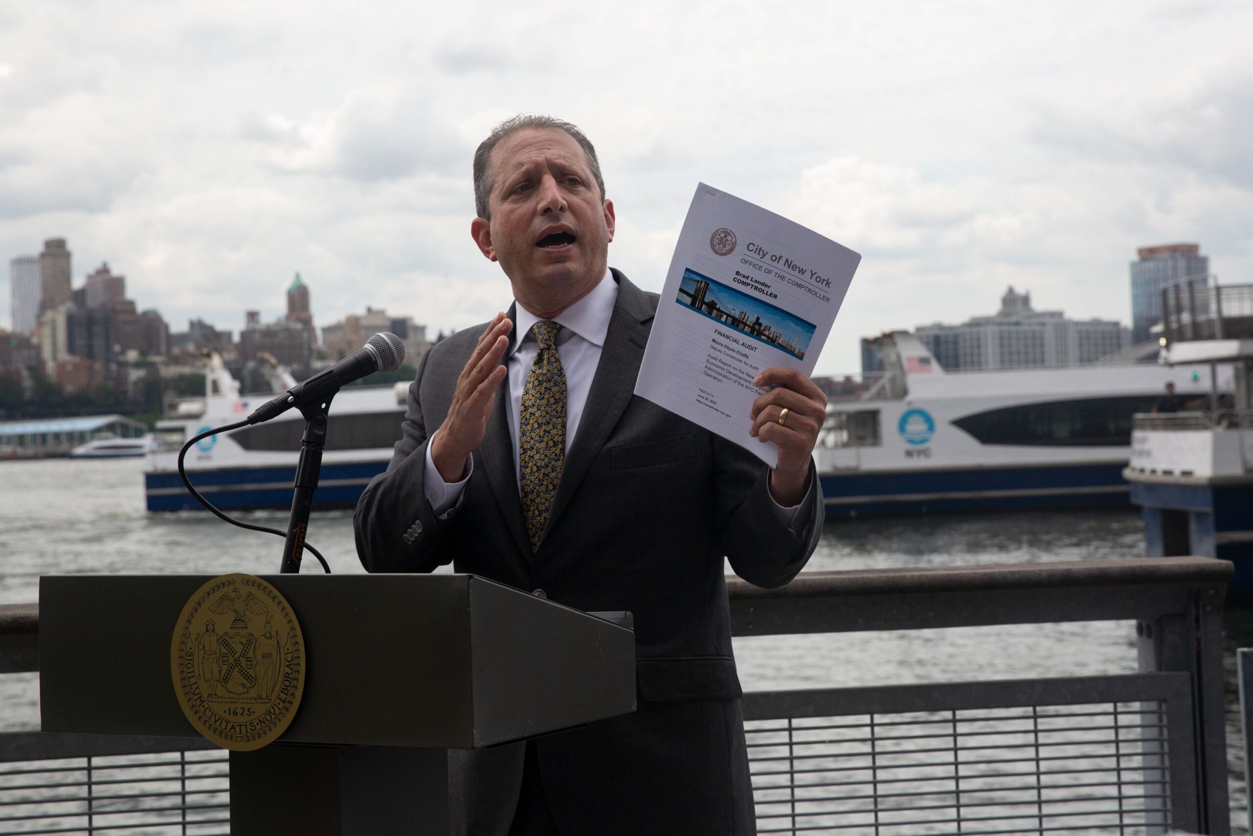 Comptroller Brad Lander speaks near Wall Street’s Pier 11 about his report detailing the city’s over payment for NYC Ferry service, July 6, 2022.