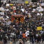 Police Cars Burn, Windows Shatter as Protests Roil New York