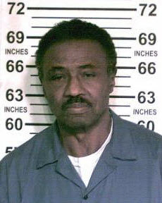 herman bell in a 2017 prison photo, looking at the camera