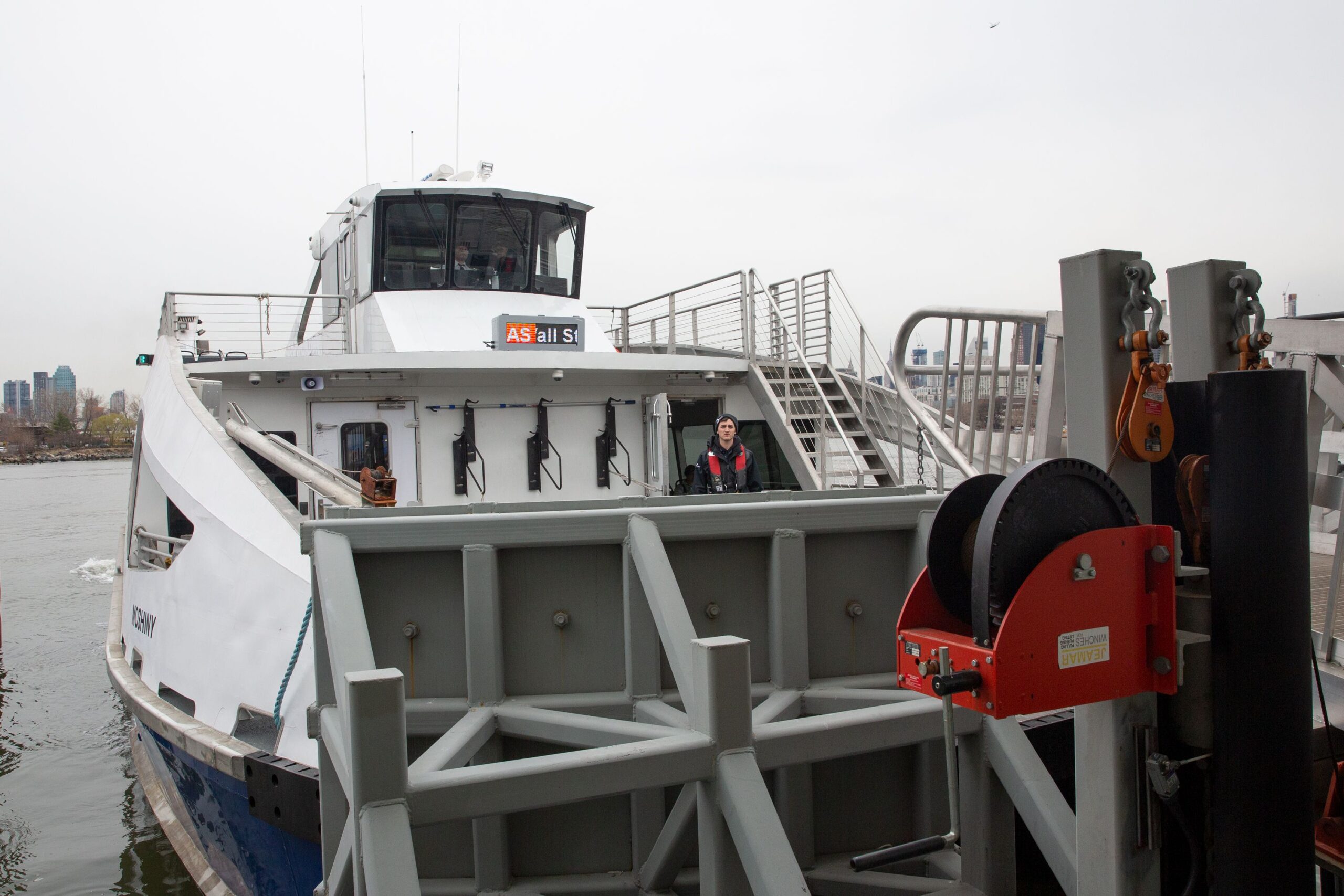 An NYC Ferry boat docks in Astoria, Queens, April 5, 2019.