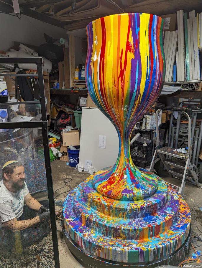 Moully's “Overflowing Blessings” is an interactive art project, honoring the idea that Jewish people ensure kiddush cups are filled to the top and then overflowed, visualizing bountiful blessings.