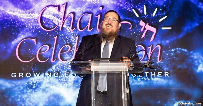 Rabbi Shlame Landa speaks at a recent gala celebrating 18 years of Chabad of Fairfield.
