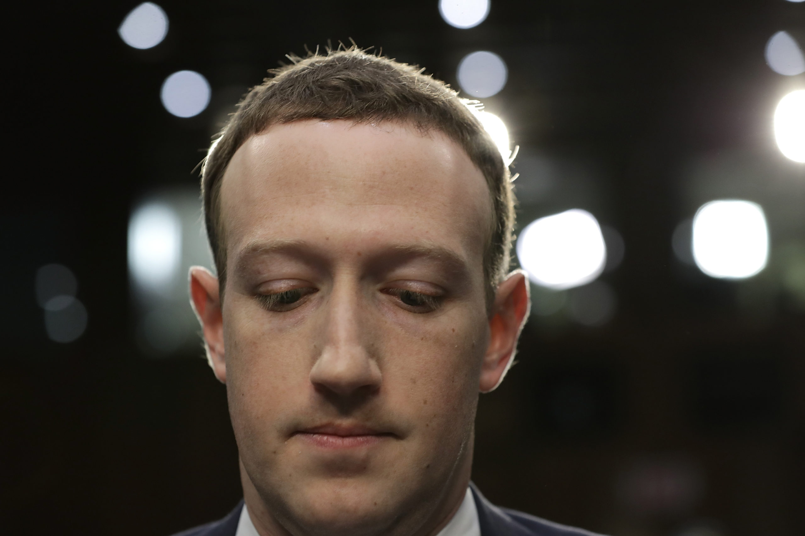 WASHINGTON, DC - APRIL 10: Facebook co-founder, Chairman and CEO Mark Zuckerberg testifies before a combined Senate Judiciary and Commerce committee hearing in the Hart Senate Office Building on Capitol Hill April 10, 2018 in Washington, DC. Zuckerberg, 33, was called to testify after it was reported that 87 million Facebook users had their personal information harvested by Cambridge Analytica, a British political consulting firm linked to the Trump campaign. Chip Somodevilla/Getty Images