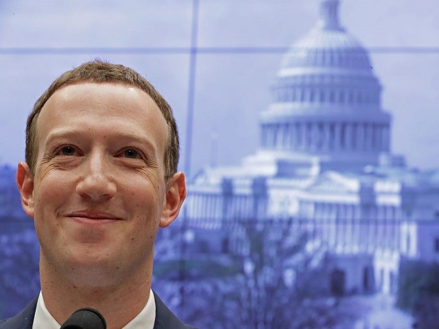 Facebook co-founder, Chairman and CEO Mark Zuckerberg arrives to testify before the House Energy and Commerce Committee in the Rayburn House Office Building on Capitol Hill April 11, 2018 in Washington, DC. This is the second day of testimony before Congress by Zuckerberg, 33, after it was reported that 87 million Facebook users had their personal information harvested by Cambridge Analytica, a British political consulting firm linked to the Trump campaign.