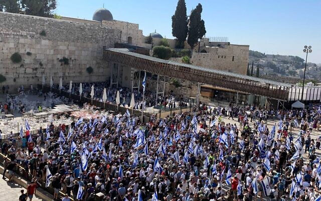 Pro and anti-overhaul demonstrators hold prayers at the Western Wall, in Jerusalem, July 23, 2023. (Charlie Summers/The Times of Israel)