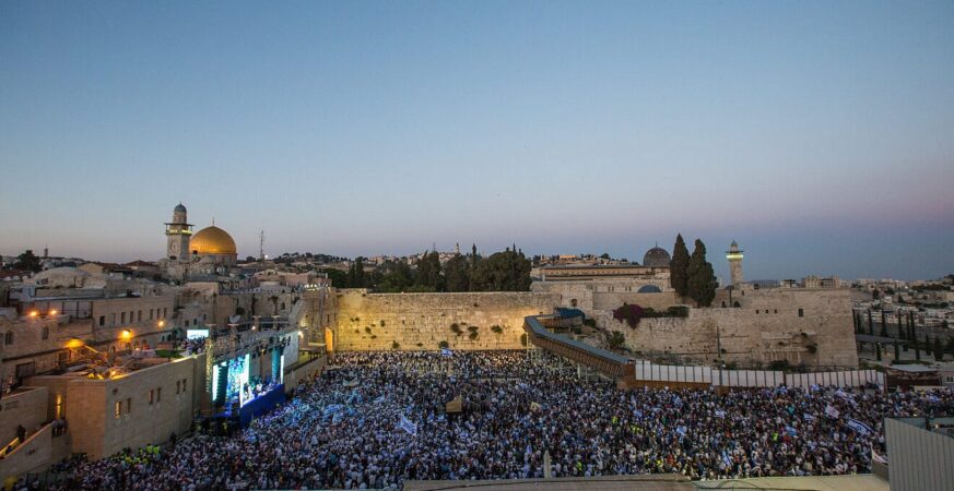 Thousands of Jewish wave the Israeli flags as they celebrate Jerusalem Day, marking the 50th anniversary of the reunification of the city in June 1967, on their way to the Western Wall, May 24, 2017. Photo by Maor Kinsbursky/Flash90.