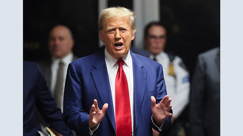 A NY appeals court judge rejected Trump’s bid to delay his April 15th hush money criminal trial. Photo Credit: Brendan McDermid/Pool Photo via AP