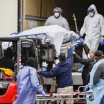 As NY Virus Deaths Rise, Morgues & Cemeteries are Overwhelmed