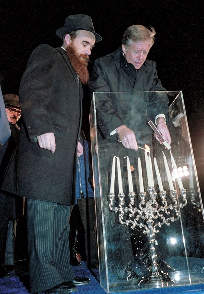 On the fourth night of Chanukah 1979, Jimmy Carter joined Rabbi Abraham Shemtov and became the first American president in history to publicly light a Chanukah menorah, kicking off an annual tradition in Washington, D.C. - Jimmy Carter Presidential Library and Museum