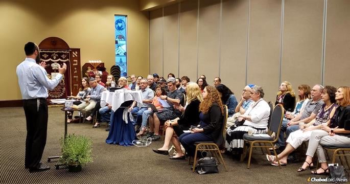 FILE PHOTO: Rabbi Silverman speaks at program ahead of the High Holidays at Chabad of Cobb County.
