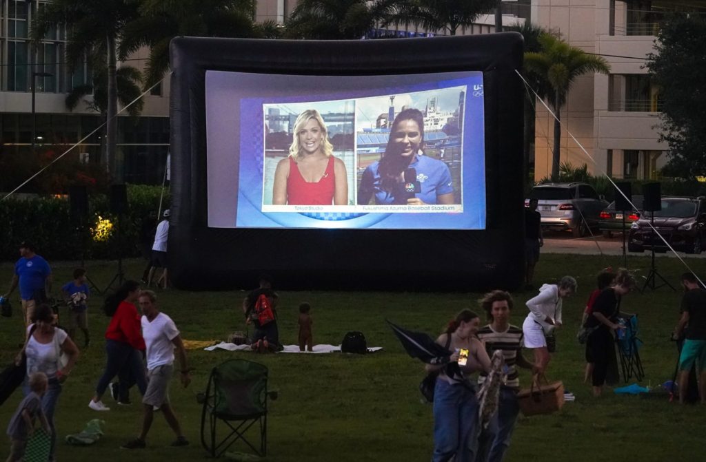 An untimely downpour scatters spectators at a Monday, July 26, 2021, watch party for Jake Ilardi's Olympic competition in Sarasota, Florida. Ilardi is representing the United States at the Tokyo Olympics while competing in street skateboarding. Syndication Sarasota Herald Tribune