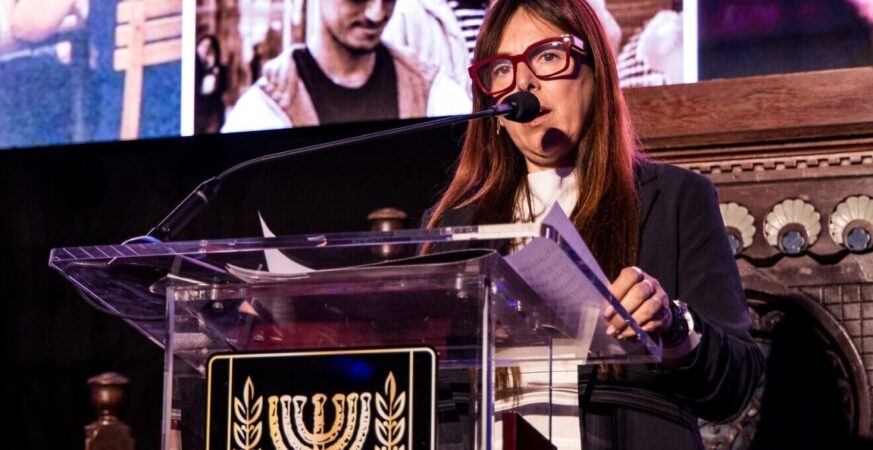Ayelet Samerano, whose 21-year-old son, Yonatan Samerano, was shot by Hamas terrorists and abducted by a UNRWA social worker on Oct. 7, 2023, speaks at a memorial, sponsored by the Israeli Consulate General in New York and the Israeli-American Council, at Park East Synagogue on Manhattan's Upper East Side on Oct. 28, 2024. Credit: Ohad Kab studio/Israeli Consulate General