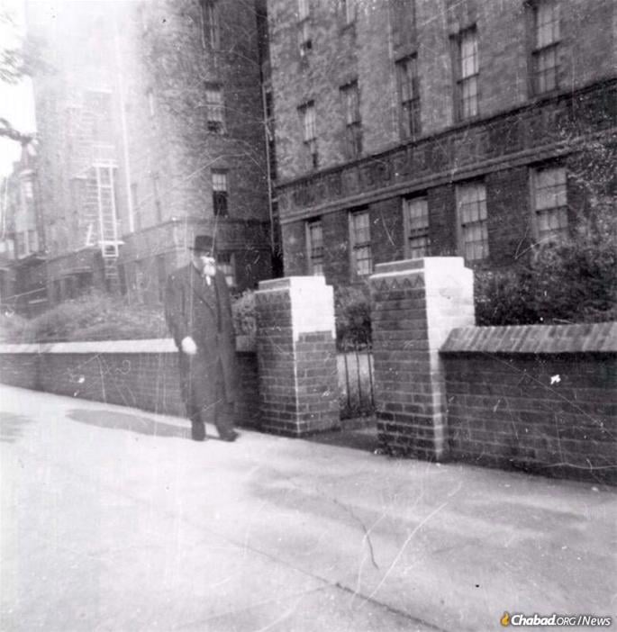The Rebbe walks down Eastern Parkway in the early years of his leadership.