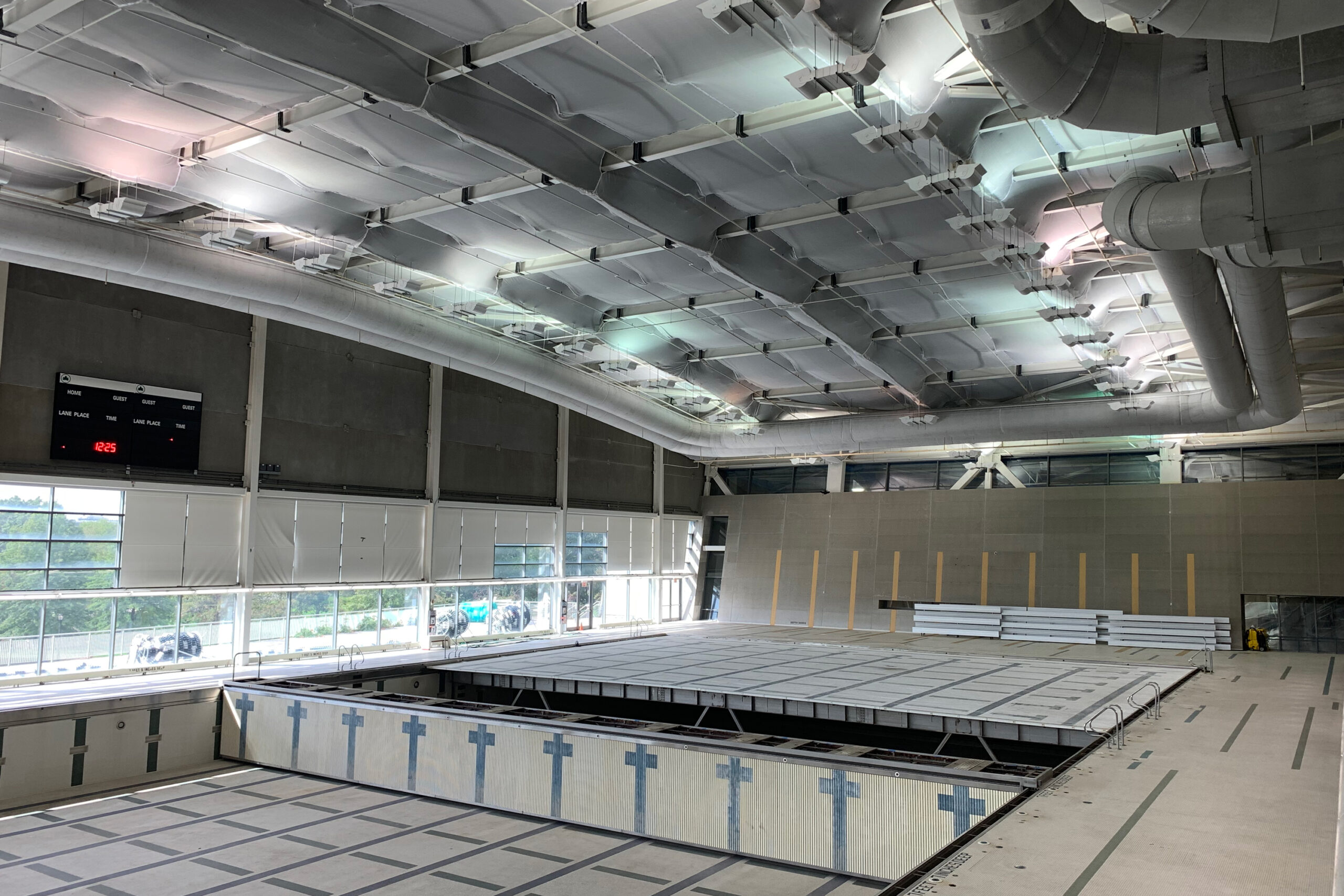 The Flushing Meadows Corona Park Pool still had netting on its ceiling after undergoing several years of renovations.