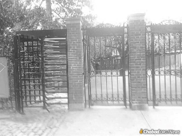 The Rebbe climbed over this turnstile gate (pictured left) to perform Tashlich at the Brooklyn Botanic Garden in 1956.