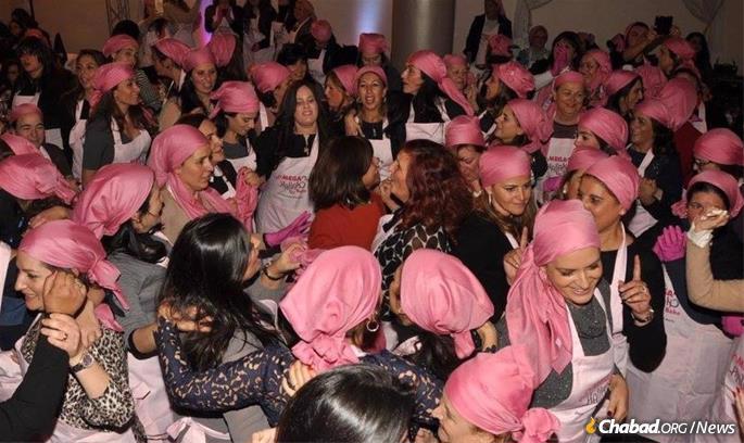 Joyous dancing after Morocco’s annual “Mega Challah Bake” organized by Banon and held at the Chabad Beth Rivkah campus (File photo).