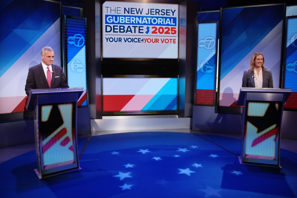 Republican candidate for governor of New Jersey Jack Ciattarelli (L) and Democrat Mikie Sherrill (R) during a debate at New Brunswick Performing Arts Center on October 08, 2025.