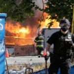 On Portland’s streets: Anger, fear, and a fence that divides