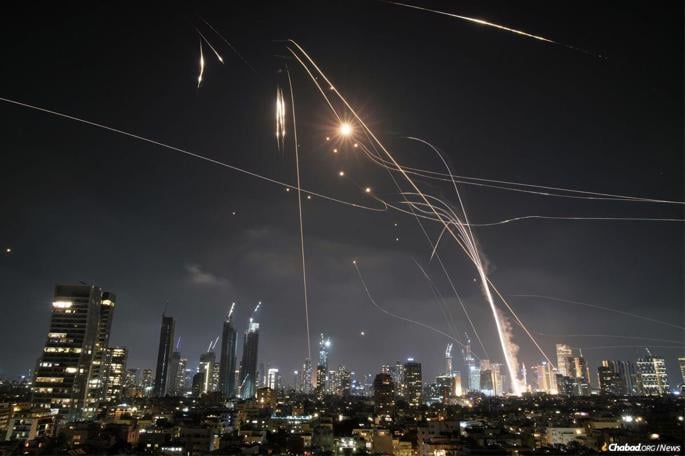 Israeli air-defense systems battle ballistic missiles sent from Iran. - Via X