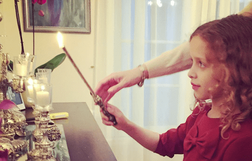 Chaya Simons lighting candles.